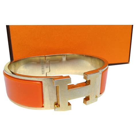 Bracciali Hermès in Altro Arancione .